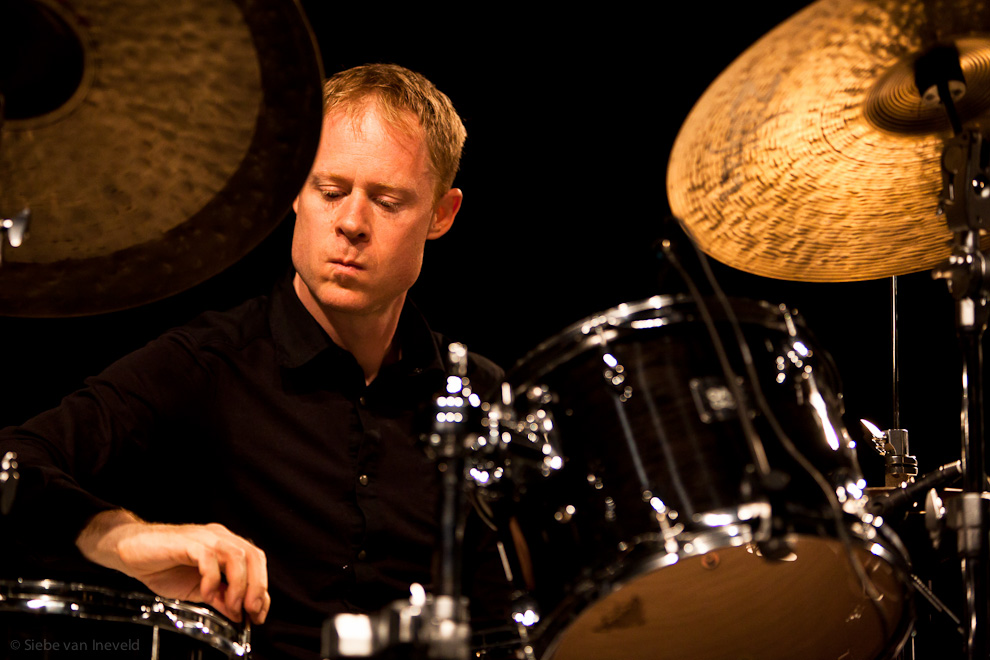 Drummer Bill Stewart tuning the drums for the Joshua Redman Double Trio. North Sea Jazz 2010. Rotterdam The Netherlands.